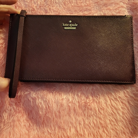 kate spade Handbags - KATE SPADE LARGE WRISTLET WINE COLOR EUC